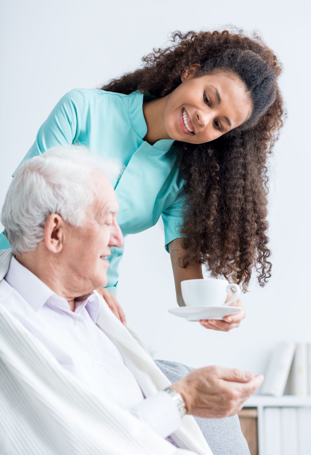 offering elderly something to drink